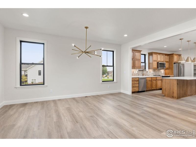 Spacious, unfurnished interior of a new home in Cottages at Kelly Farm, Greeley (Image 29).