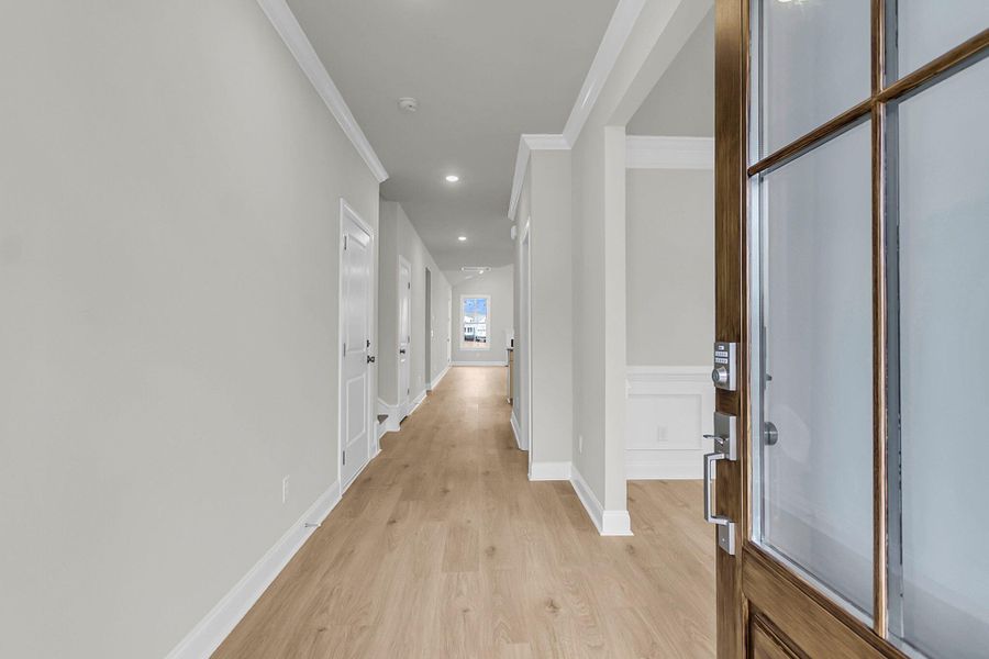 Spacious, unfurnished interior of a new home in Tidewater at Lakes of Cane Bay, Summerville (Image 39).