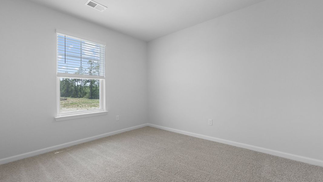 Representative unfurnished interior of a home built from the Aisle by D.R. Horton in Pine Hills at Cane Bay, Summerville (Image 20).