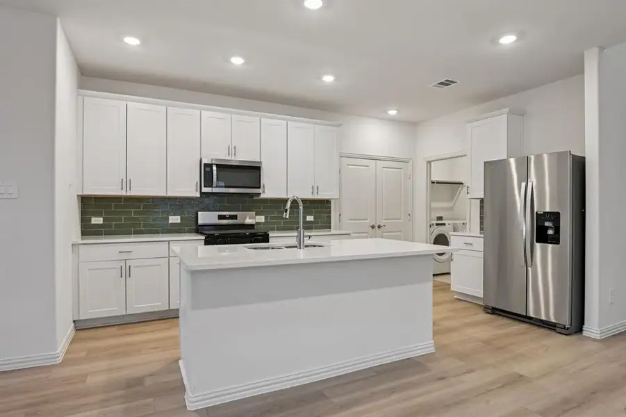 Photo is not of the actual home, but is an inspirational photo of builder’s model home and may depict options, furnishings, and/or decorator features that are not included.