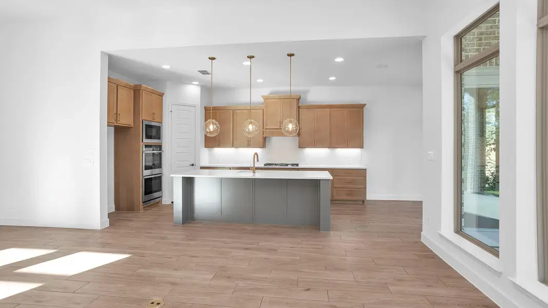 Furnished interior view inside a new home in The Highlands 65', Porter (Image 9).