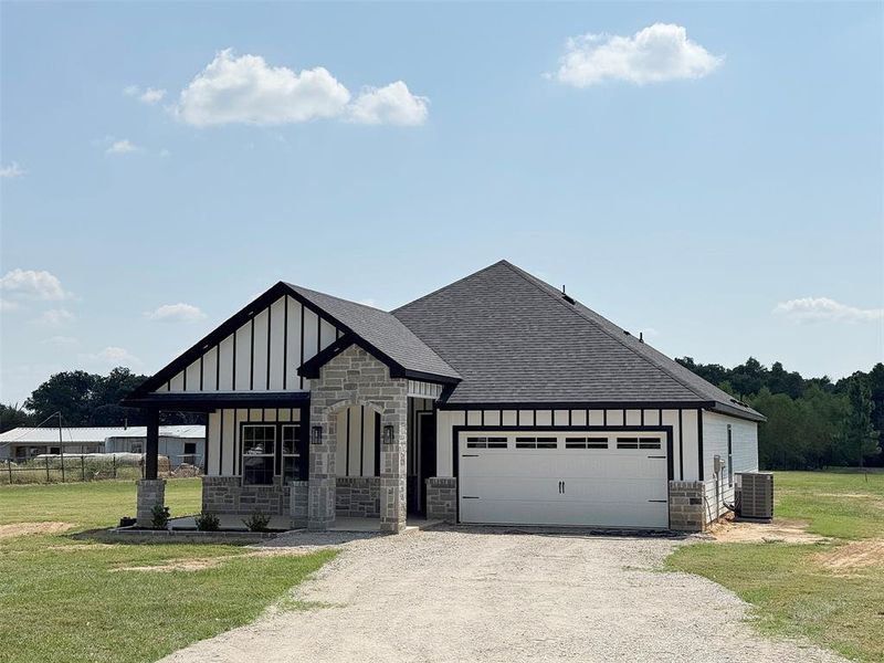 Front exterior of a new home in , Mabank, TX, highlighting curb appeal (Image 17).