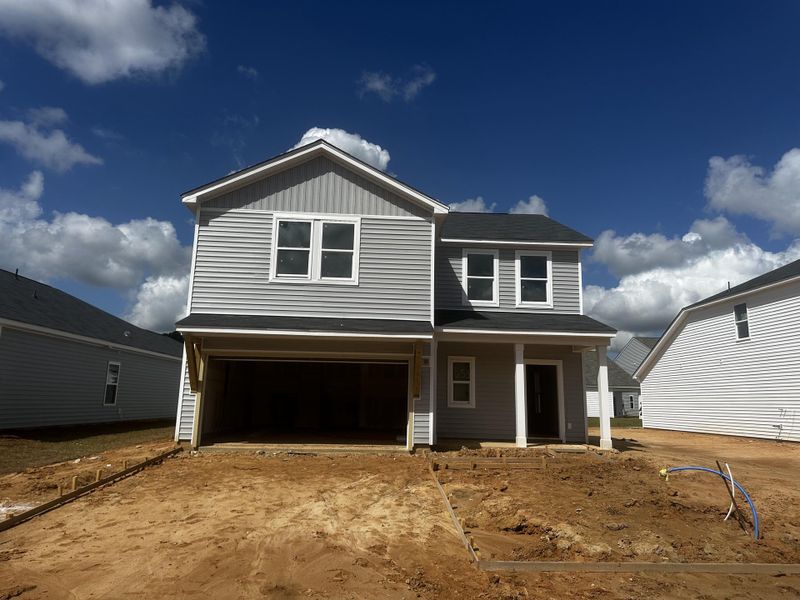 Exterior details and patio area of a home in Watson Hill, Summerville (Image 14). Exterior details and patio area of a home in Watson Hill, Summerville (Image 14).