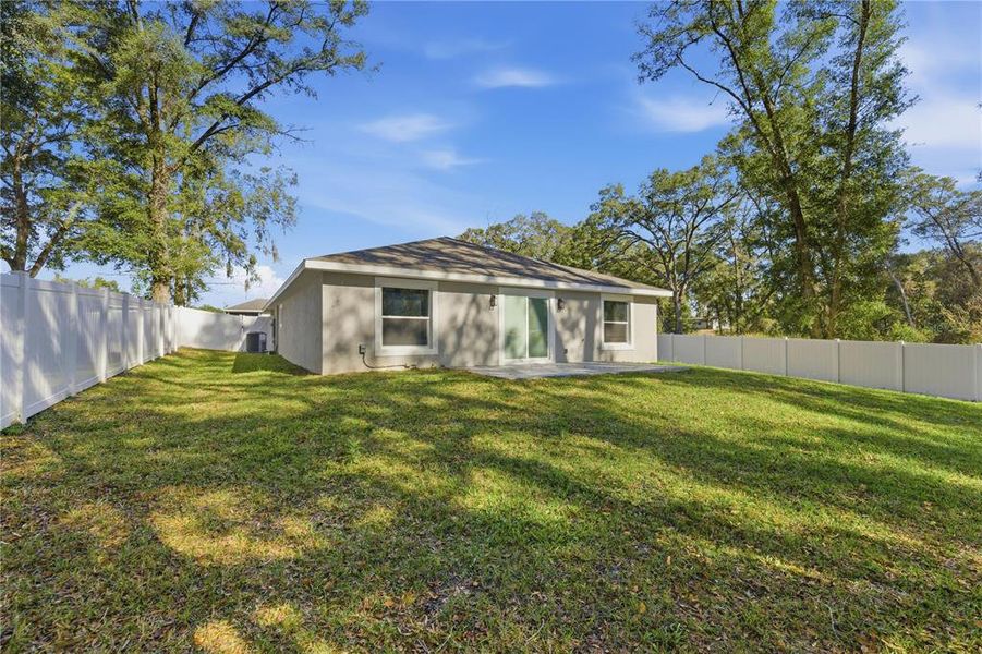 Exterior details and patio area of a home in , Summerfield (Image 19).