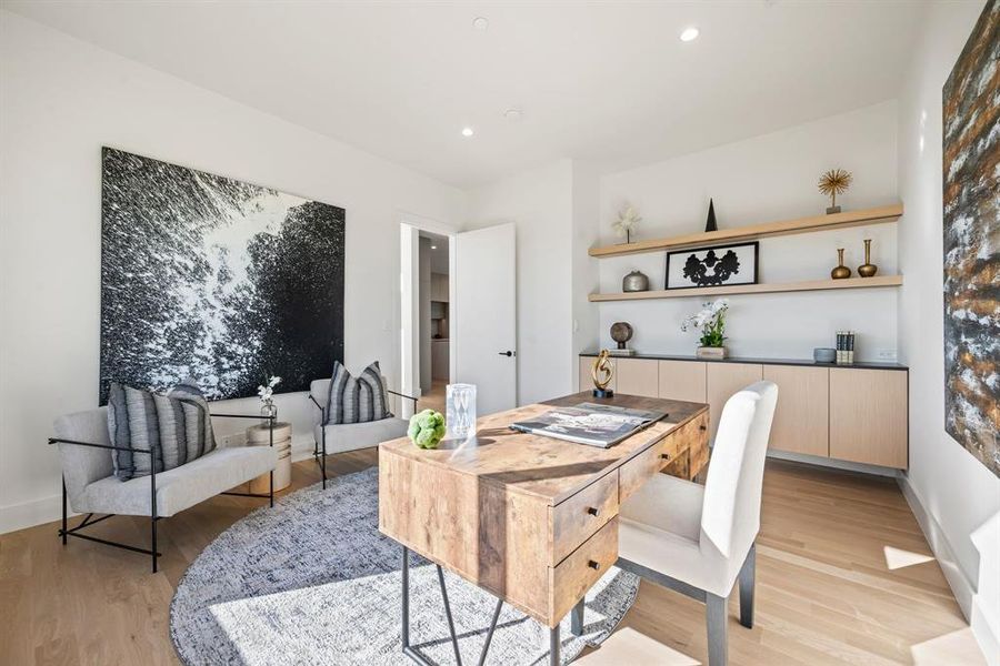 Private office featuring custom built-ins and designer finishes. Private office featuring custom built-ins and designer finishes.