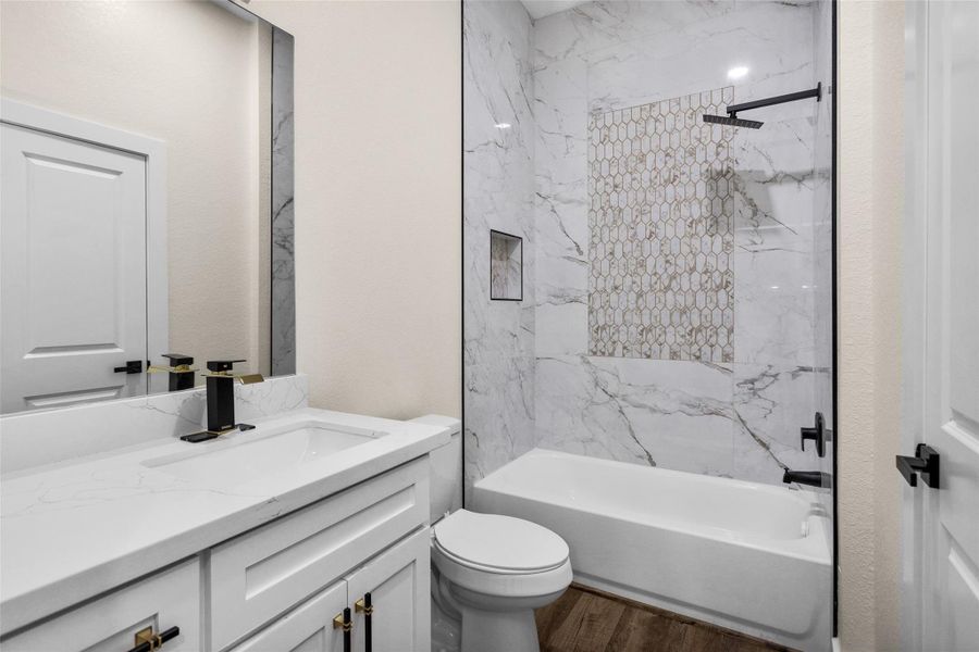 Bedroom #2 full private bath with tub/shower combo and vanity with plenty of storage. Bedroom #2 full private bath with tub/shower combo and vanity with plenty of storage.