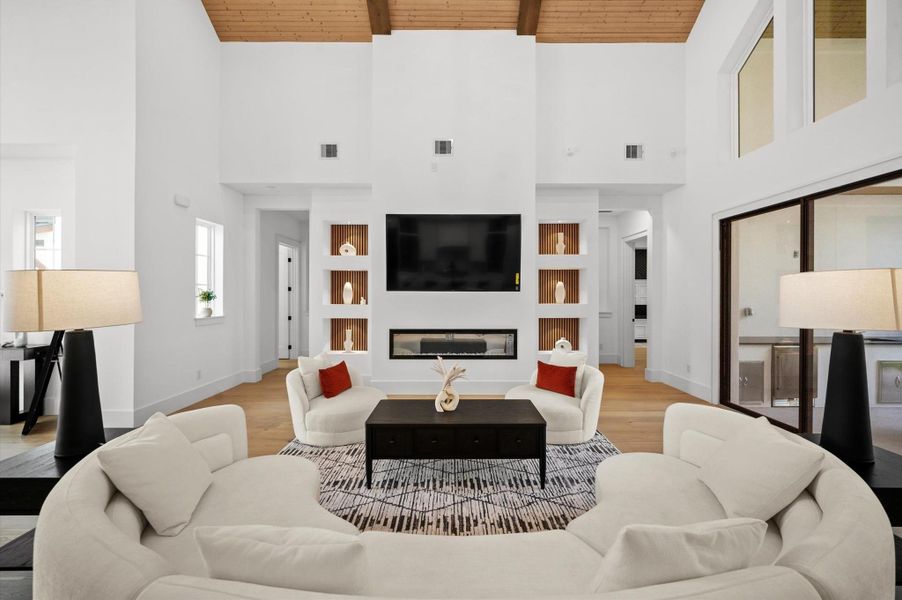 Contemporary fireplace creates the perfect focal point for the open-concept living area.
