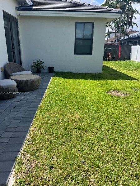 Exterior details and patio area of a home in , Miami (Image 3).