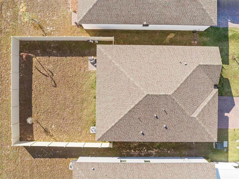 Exterior details and patio area of a home in Deer Run at Crosswinds, Davenport (Image 34).