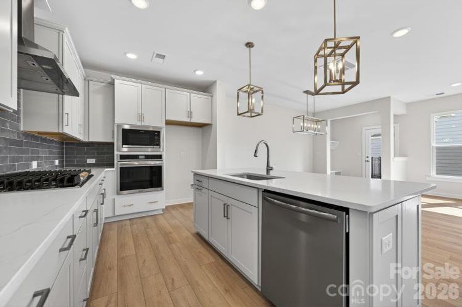 Furnished interior view inside a new home in North Creek Village - Townhomes, Huntersville (Image 7).