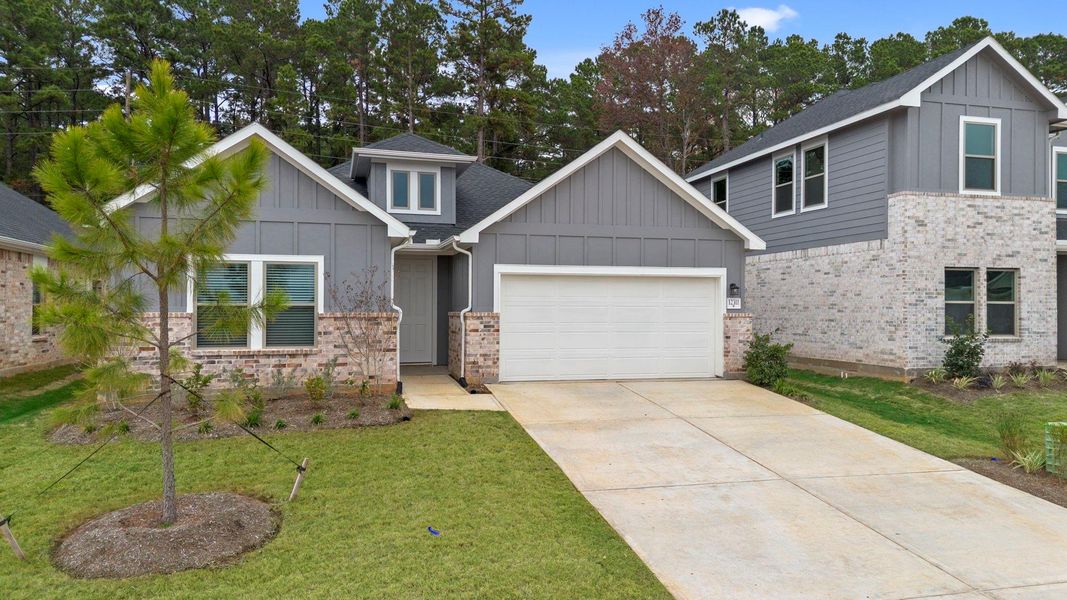 Front exterior of a new home in Westridge Cove 50', Panorama Village, TX, highlighting curb appeal (Image 19).