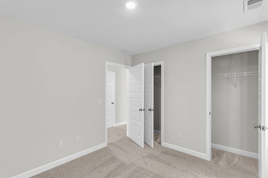 Spacious, unfurnished interior of a new home in Pineland Preserve, Summerville (Image 43).