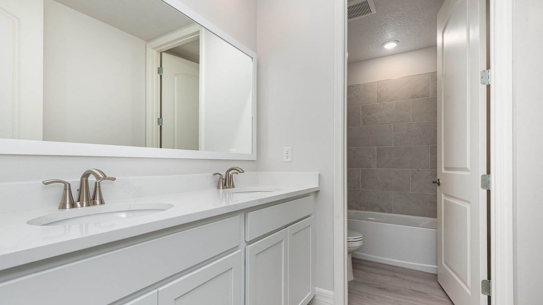Representative furnished interior of a home built from the Jordyn II by D.R. Horton in Riverwalk of Cocoa, Cocoa (Image 6).