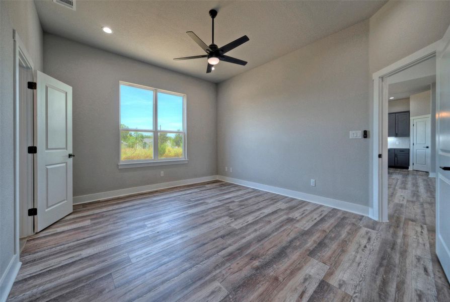 High ceilings and modern plank flooring define this versatile secondary room. High ceilings and modern plank flooring define this versatile secondary room.