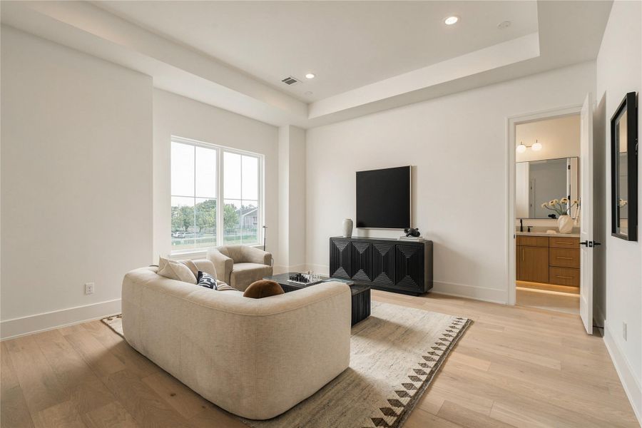A second perspective highlights the game room’s generous scale and flexibility, offering ample space for movie nights, game days, or a relaxed secondary lounge.