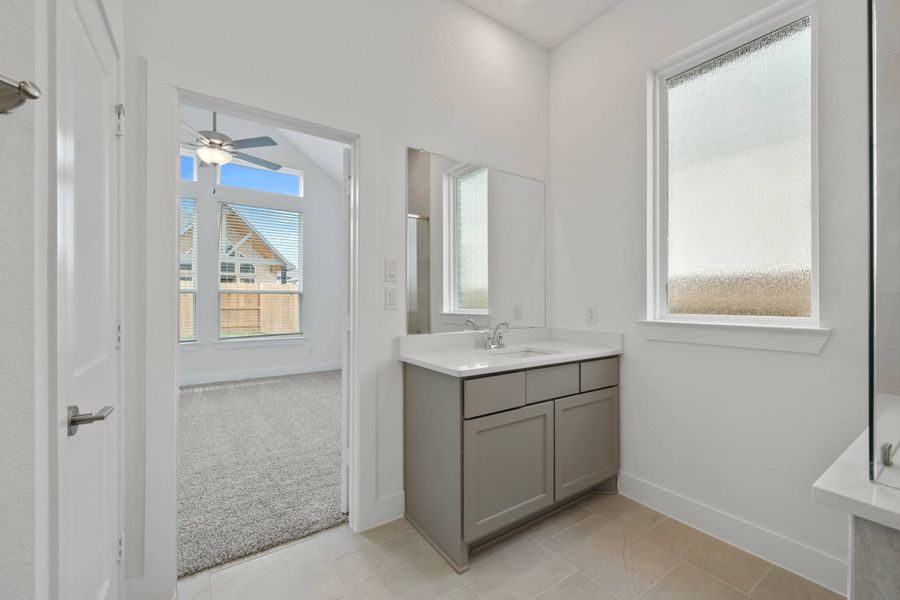 Representative furnished interior of a home built from the Summerton by Chesmar Homes in Wood Leaf Reserve, Tomball (Image 4).