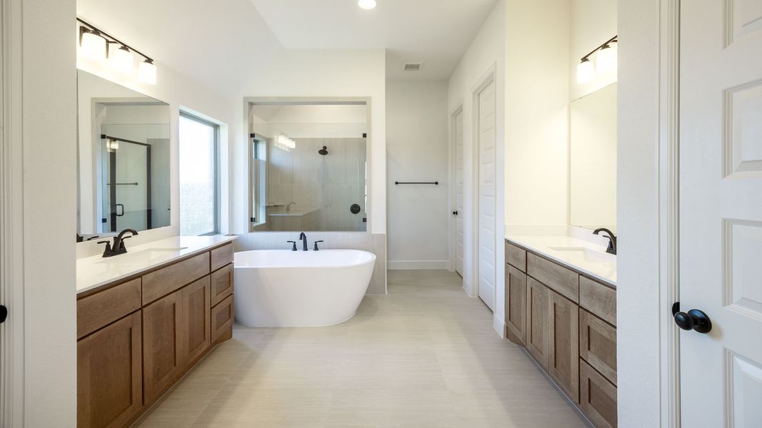 Furnished interior view inside a new home in Santa Rita Ranch - Tierra Rosa, Liberty Hill (Image 6). Furnished interior view inside a new home in Santa Rita Ranch - Tierra Rosa, Liberty Hill (Image 6).