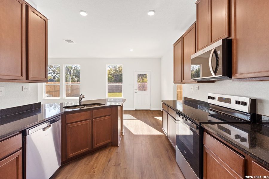 Furnished interior view inside a new home in Spanish Trails Villas, San Antonio (Image 10).