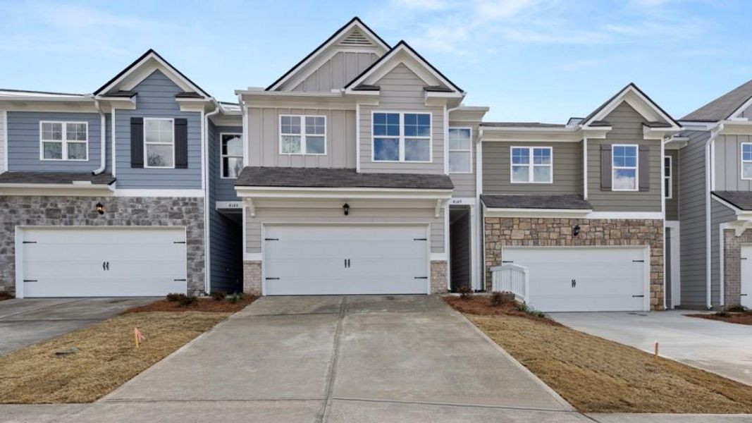 Front exterior of a new home in Falcon Landing, Gainesville, GA, highlighting curb appeal (Image 2).