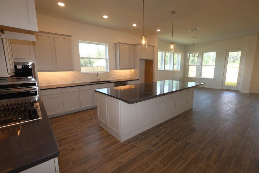 Furnished interior view inside a new home in Sundance Cove Lakeside - Overlook View Collection, Crosby (Image 4).