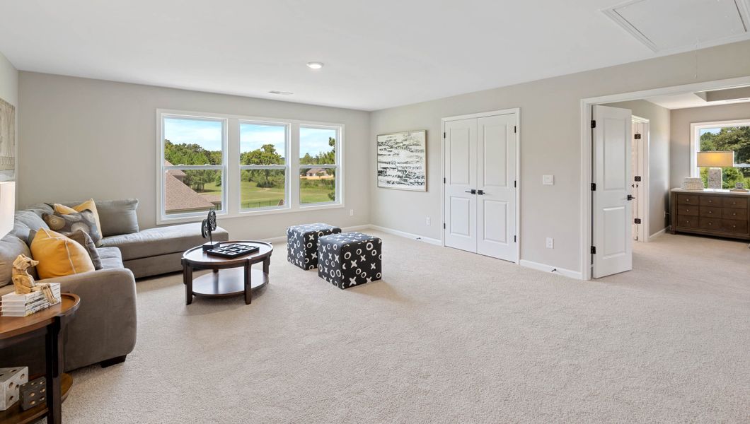Representative furnished interior of a home built from the Hampshire by D.R. Horton in Hunters Creek, Greenwood (Image 28).