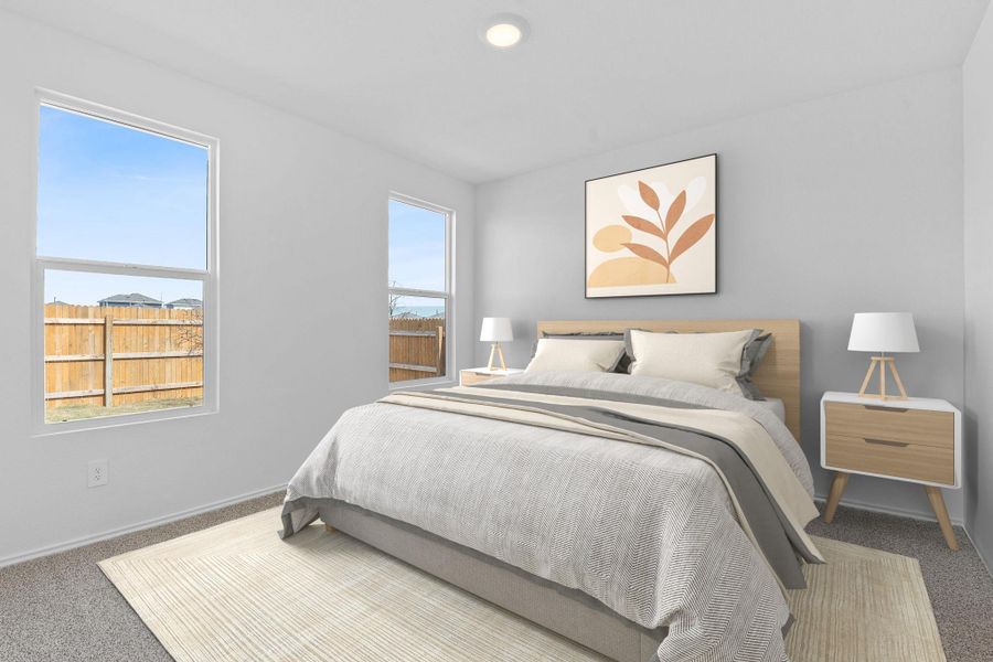 Bedroom with carpet flooring and baseboards