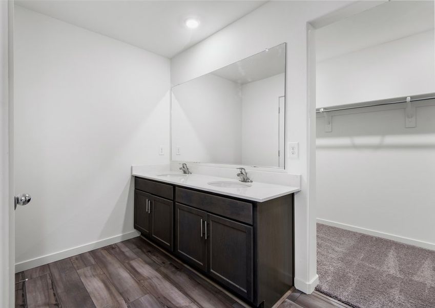 The master bathroom is filled with space for getting ready.