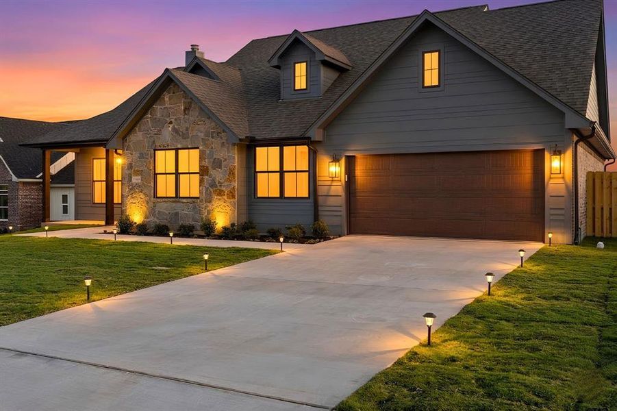 Front exterior of a new home in , Lindale, TX, highlighting curb appeal (Image 21).