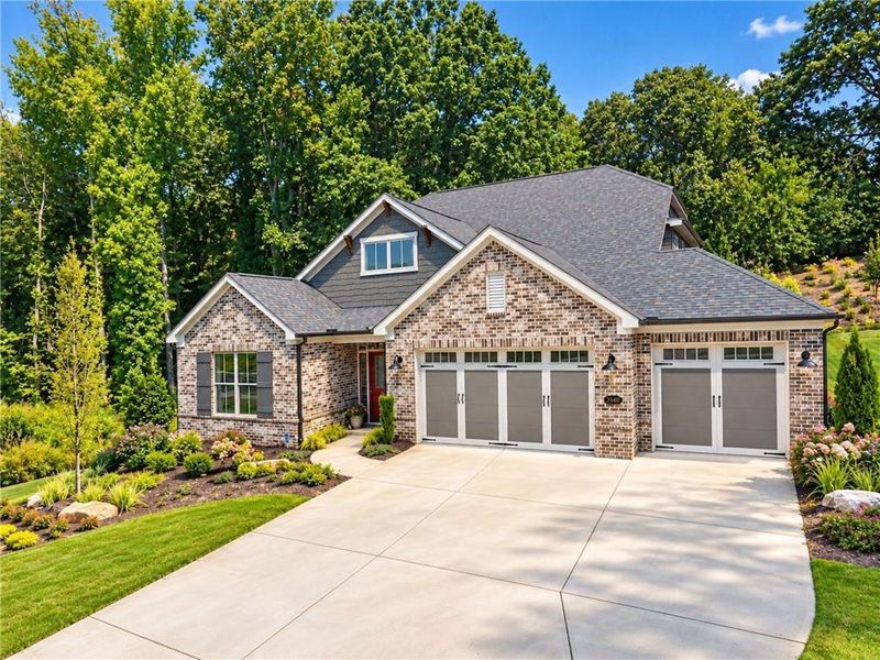 Front exterior of a new home in , Cumming, GA, highlighting curb appeal (Image 24). Front exterior of a new home in , Cumming, GA, highlighting curb appeal (Image 24).