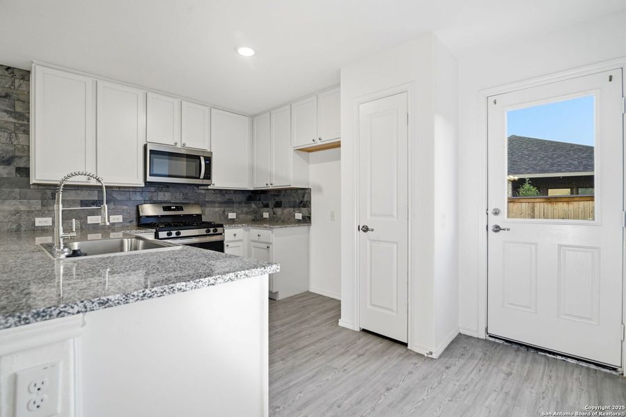 Furnished interior view inside a new home in Vida: Cottage Collection, San Antonio (Image 5). Furnished interior view inside a new home in Vida: Cottage Collection, San Antonio (Image 5).