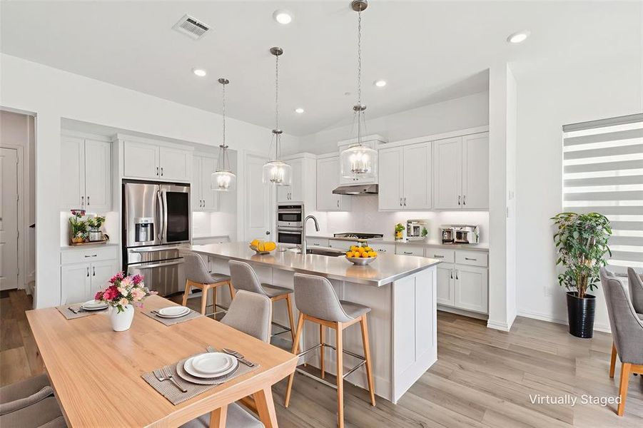 Space for a dining table and bar stools Space for a dining table and bar stools