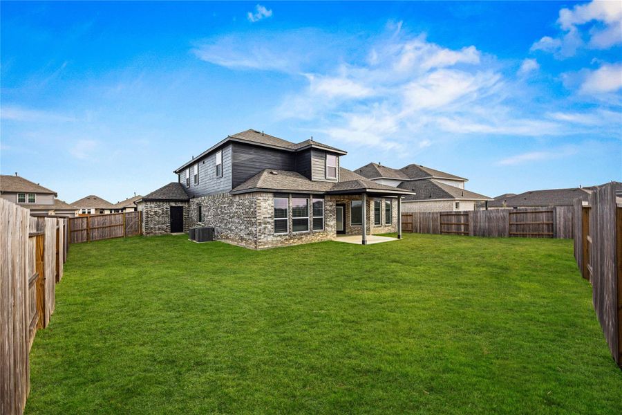 Exterior details and patio area of a home in River Ranch Meadows, Dayton (Image 24).