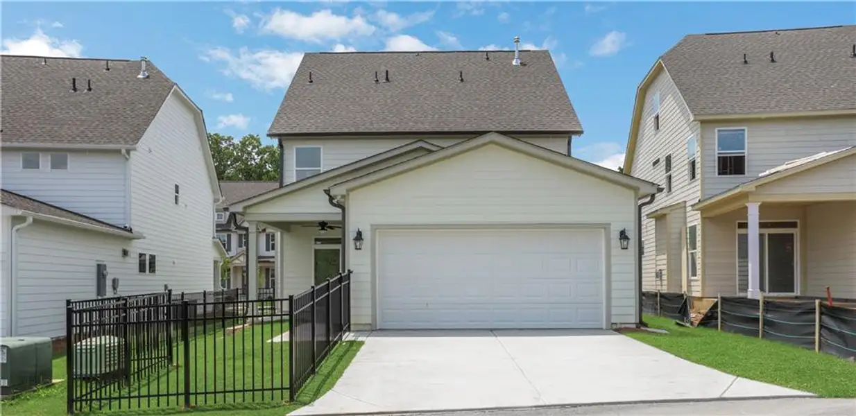 Front exterior of a new home in Marble Tree, Ball Ground, GA, highlighting curb appeal (Image 2).