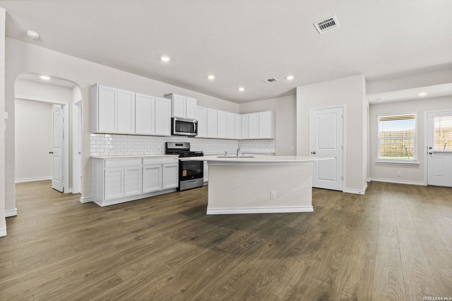 Furnished interior view inside a new home in Redbird Ranch, San Antonio (Image 8).