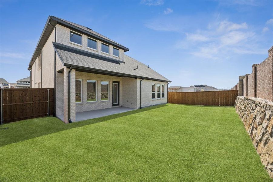 The entire family will enjoy the great outdoors in this private fenced back yard.