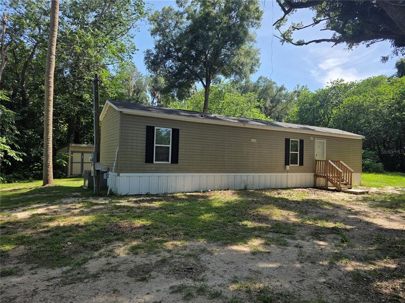 Exterior details and patio area of a home in , Reddick (Image 8).