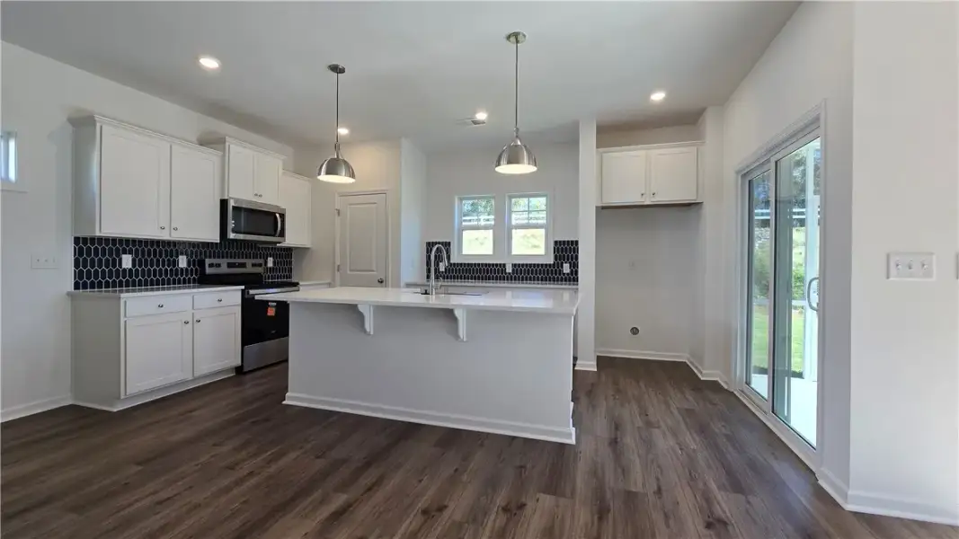 Warm wood flooring contrasts beautifully with cris