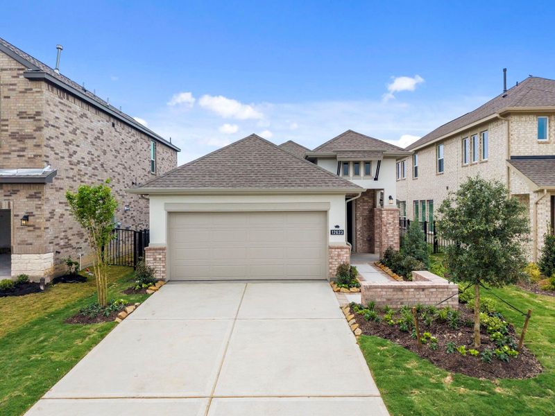 Front exterior of a new home in Bridgeland, Cypress, TX, highlighting curb appeal (Image 22).