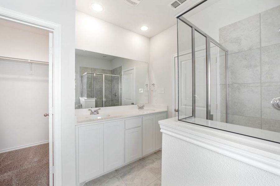 Representative exterior photo of a completed home built from the Bastrop by Impression Homes in Heartland, Heartland, TX (Image 21).