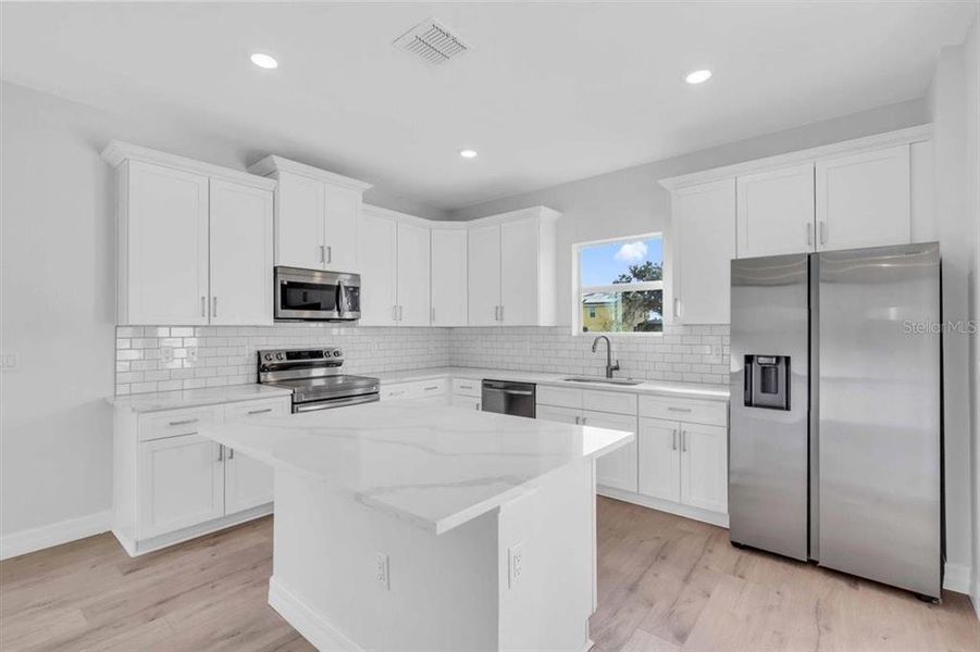 Furnished interior view inside a new home in , Punta Gorda (Image 30).