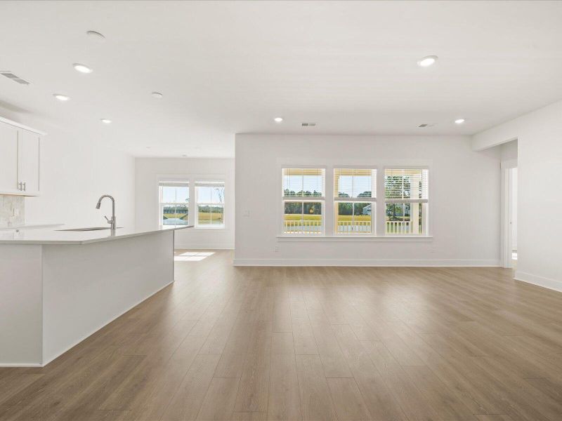Spacious, unfurnished interior of a new home in The Coves at Lakes of Cane Bay II, Summerville (Image 16). Spacious, unfurnished interior of a new home in The Coves at Lakes of Cane Bay II, Summerville (Image 16).