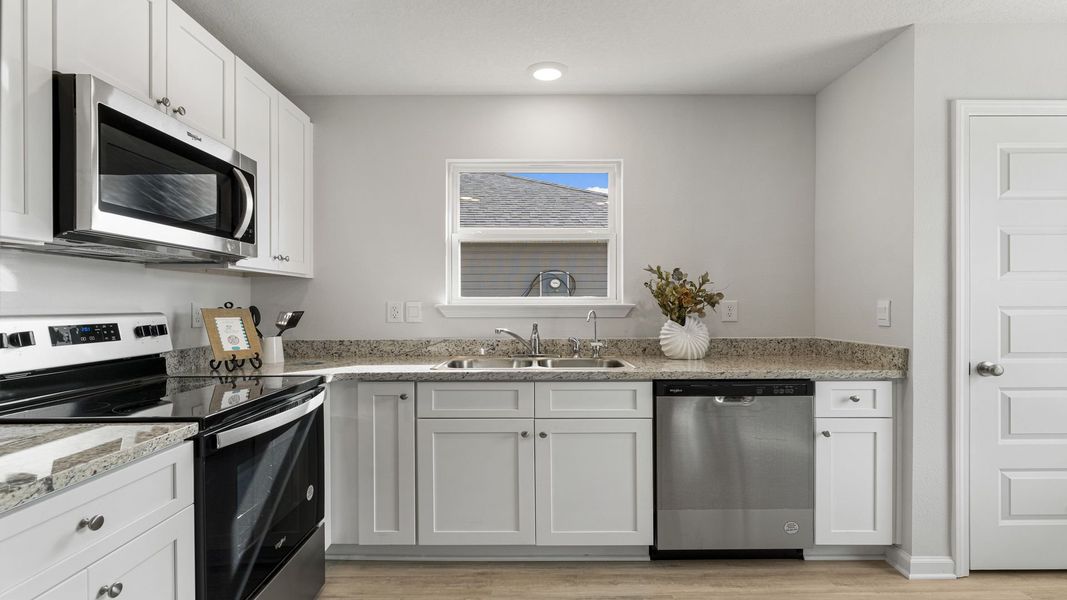 Representative furnished interior of a home built from the Callaway by D.R. Horton in Sunny Hills, Chipley (Image 11).