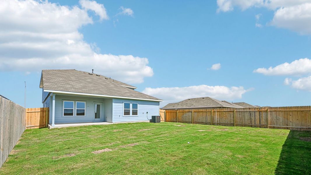 Exterior details and patio area of a home in Carillon, Manor (Image 26).