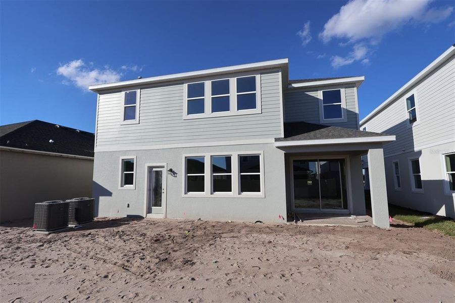 Exterior details and patio area of a home in Center Lake on the Park, St. Cloud (Image 4).