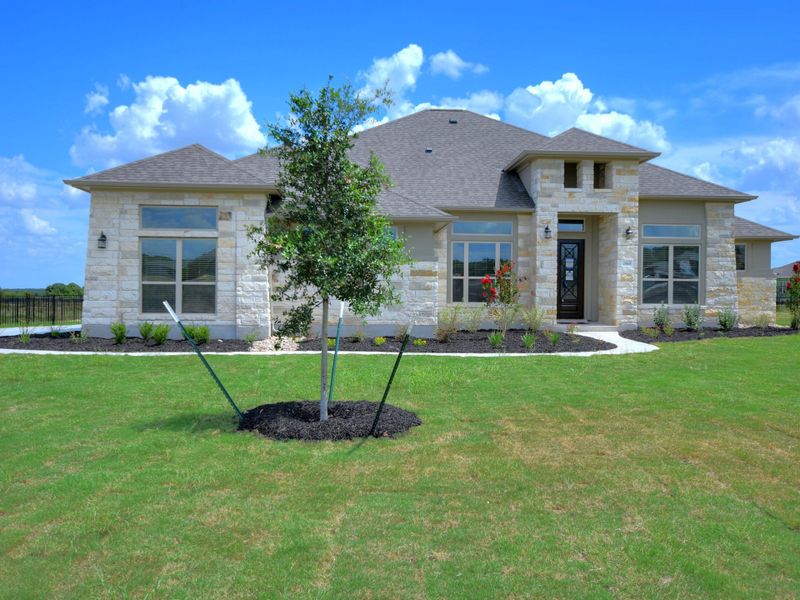 Representative exterior photo of a completed home built from the San Simeon I by Giddens Homes in Clearwater Ranch, Liberty Hill, TX (Image 53).