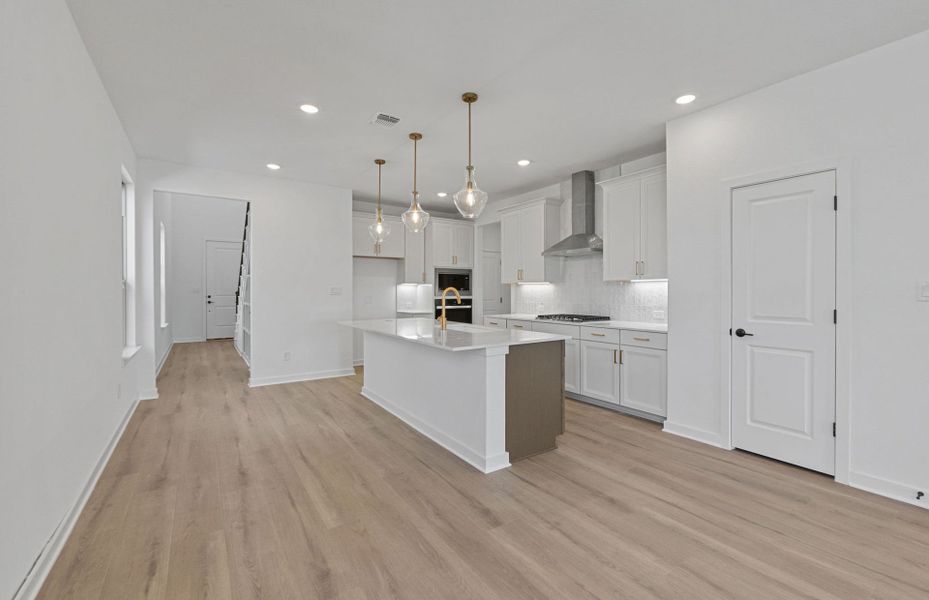 Furnished interior view inside a new home in Wolf Ranch, Georgetown (Image 9).