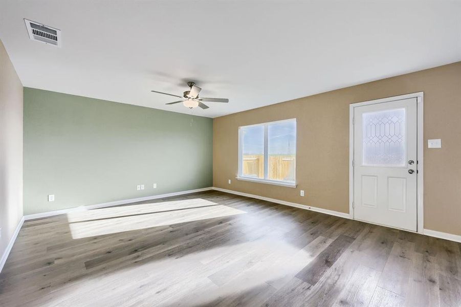 Spacious, unfurnished interior of a new home in Patriot Estates, Venus (Image 17).