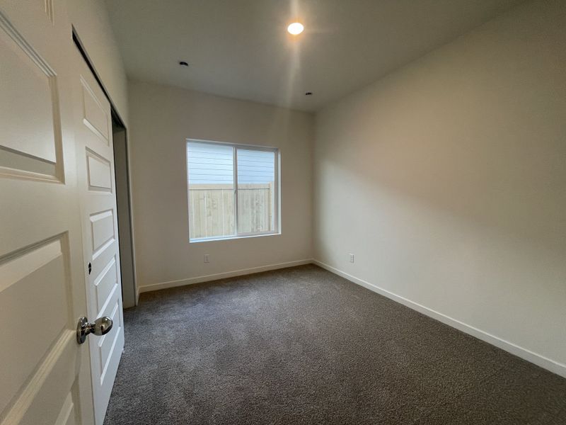 Spacious, unfurnished interior of a new home in Sage Meadows, Wellington (Image 9).