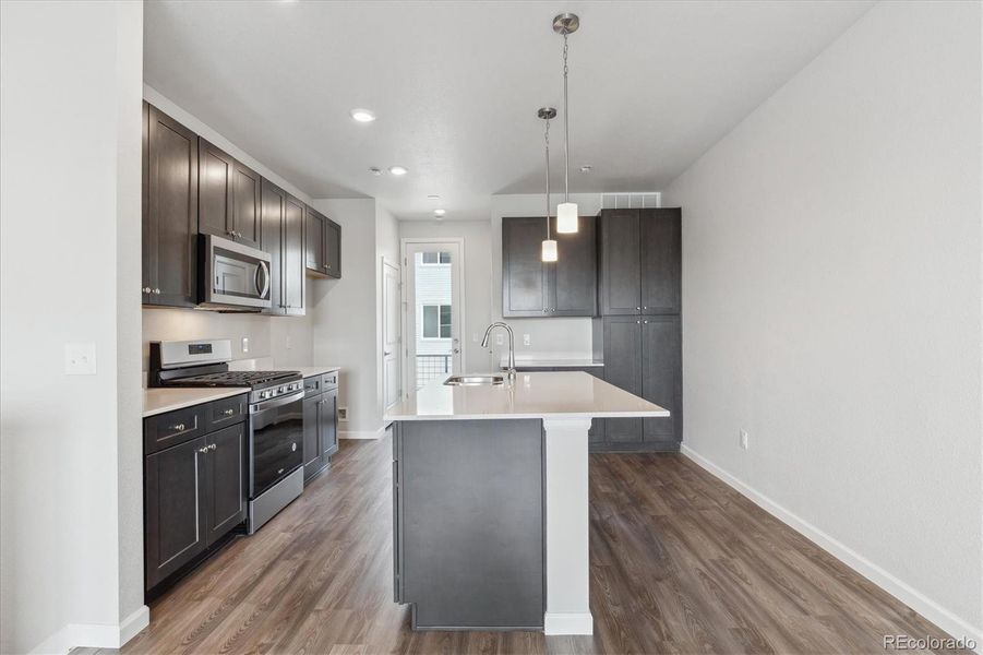 Furnished interior view inside a new home in Townhome Collection at Grand Vue at Interlocken, Broomfield (Image 5).