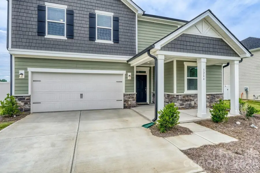 Exterior details and patio area of a home in , Midland (Image 3).